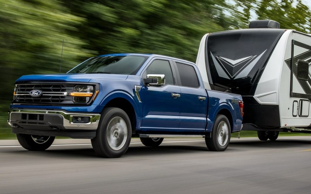 A new Ford F-150 pulls a trailer on the open road, making this the perfect road trip truck for you this holiday season. Shop for your new Ford truck near Kingsport at Johnson City Ford today.