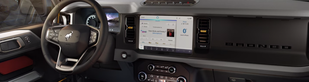 The dashboard interior of the new 2025 Ford Bronco is in view, showcasing the updated interior that makes the new Ford Bronco so special. Shop for your new Ford Bronco at Johnson City Ford today.